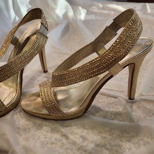Caparros gold shoes size 10